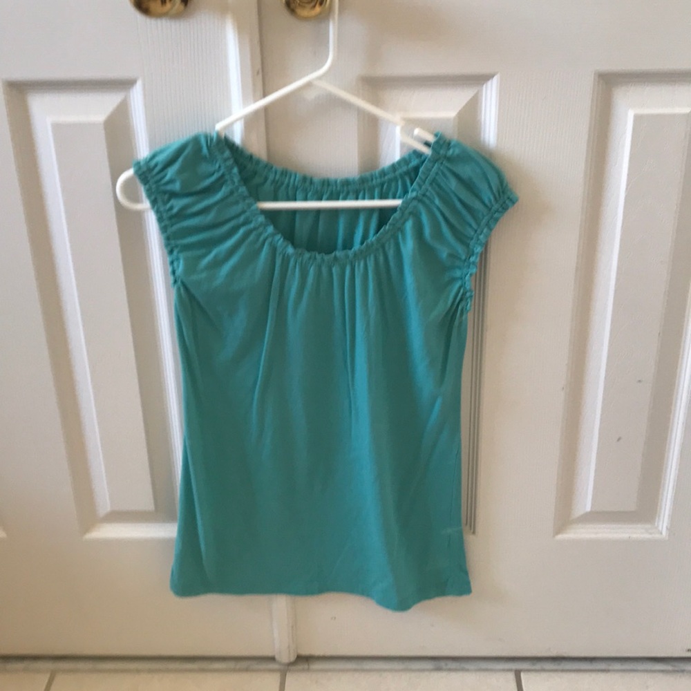 Teal like sleeveless blouse